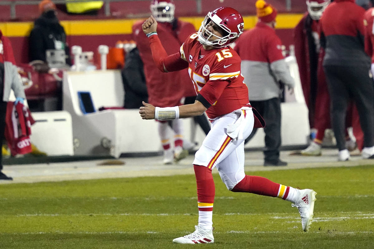 Kansas City Chiefs quarterback Patrick Mahomes celebrates after throwing a 5-yard touchdown pas ...