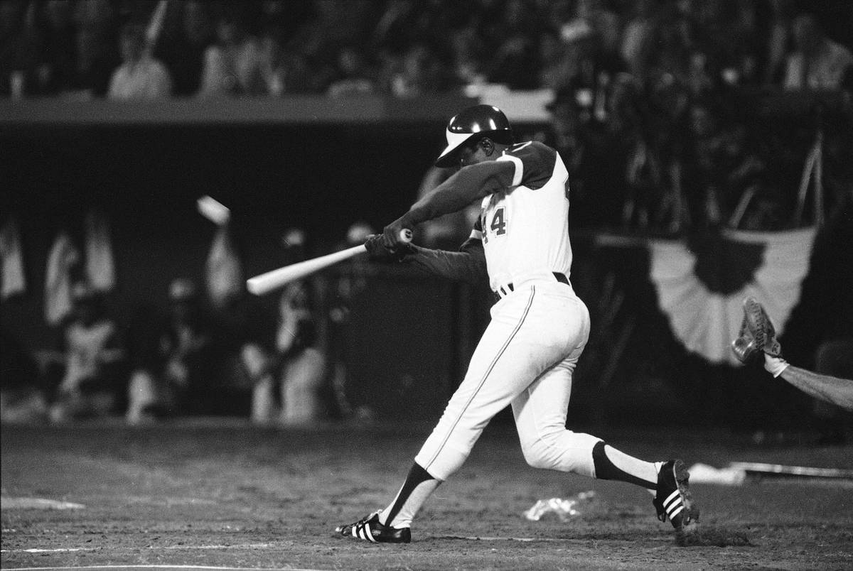 FILE - In this April 8, 1974, file photo, Atlanta Braves' Hank Aaron hits his 715th career home ...