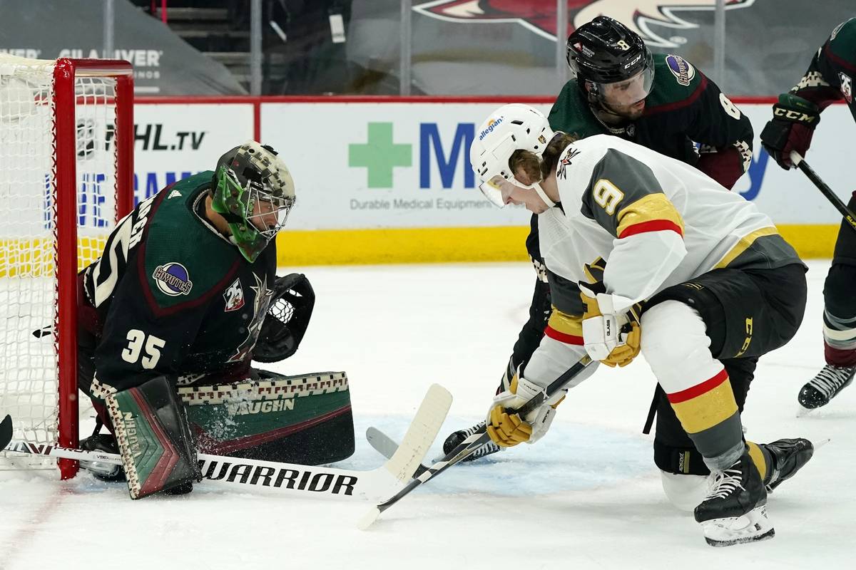 Arizona Coyotes goaltender Darcy Kuemper (35) makes a save on a shot by Vegas Golden Knights ce ...