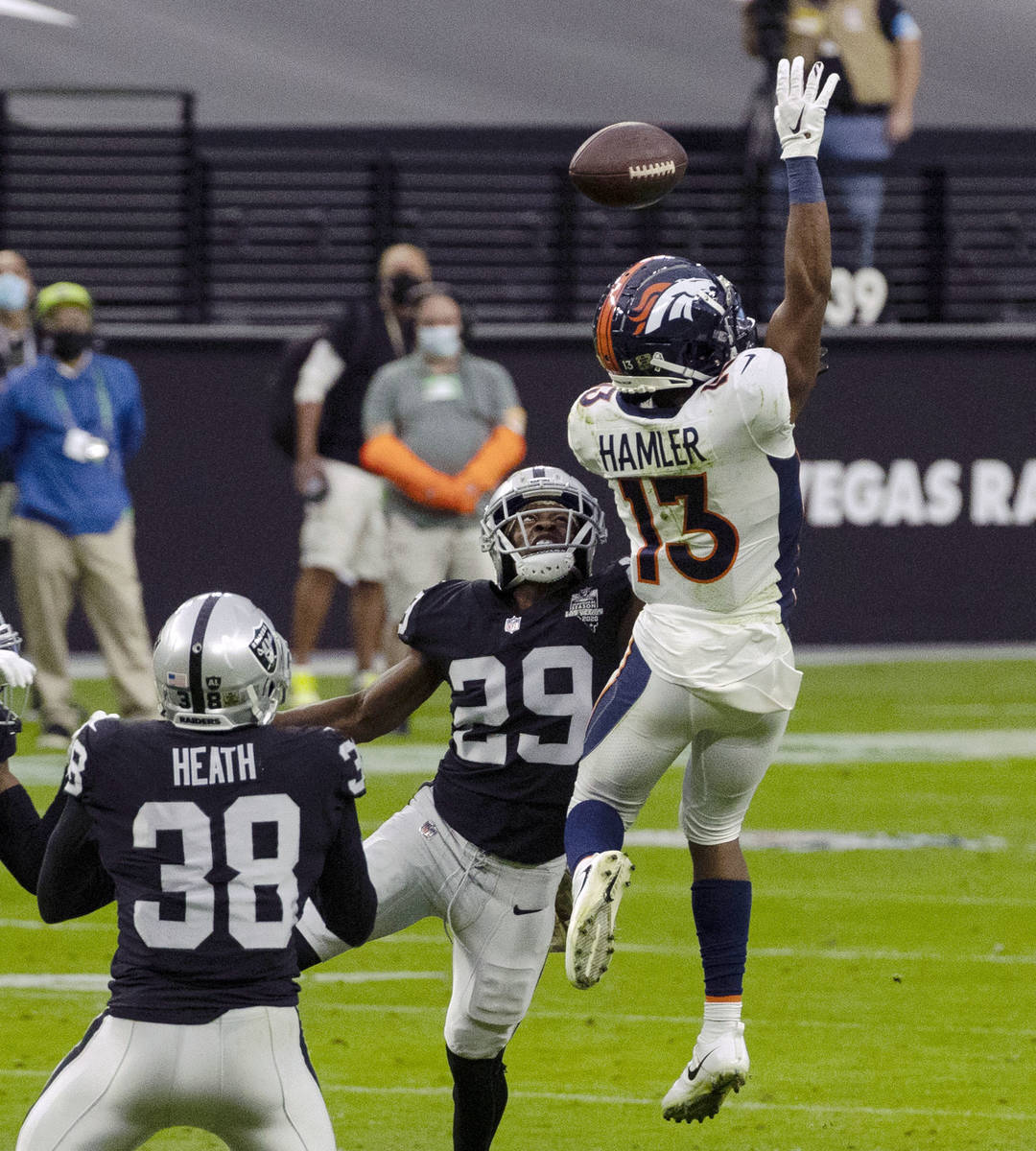 Las Vegas Raiders safety Lamarcus Joyner (29) defends as Denver Broncos wide receiver KJ Hamler ...