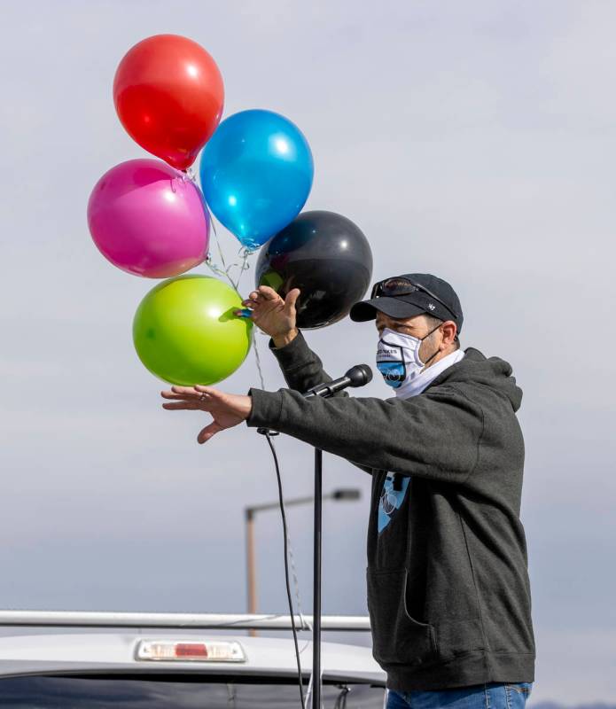 Pat Treichel with Ghost Bike Las Vegas addresses the crowd on hand for the LV5 Ghost Bike Unvei ...