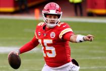 Kansas City Chiefs quarterback Patrick Mahomes looks for a receiver during the second half of a ...