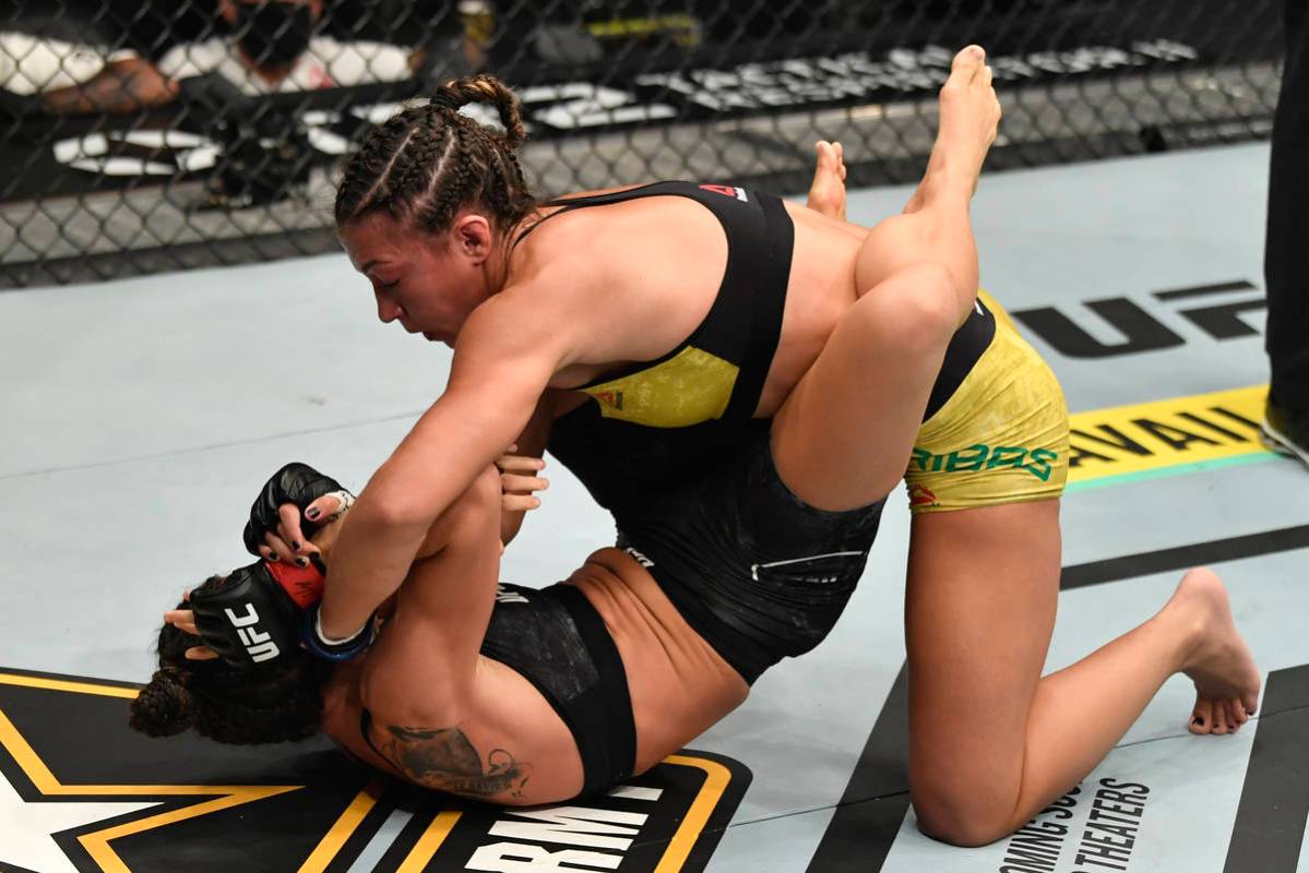 ABU DHABI, UNITED ARAB EMIRATES - JANUARY 23: (R-L) Amanda Ribas of Brazil punches Marina Rodri ...