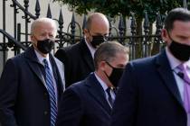 President Joe Biden departs after attending mass at Holy Trinity Catholic Church, Sunday, Jan. ...