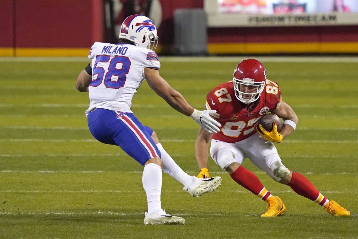 Kansas City Chiefs tight end Travis Kelce (87) runs from Buffalo Bills linebacker Matt Milano ( ...