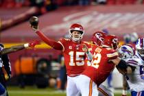 Kansas City Chiefs quarterback Patrick Mahomes throws a pass during the second half of the AFC ...