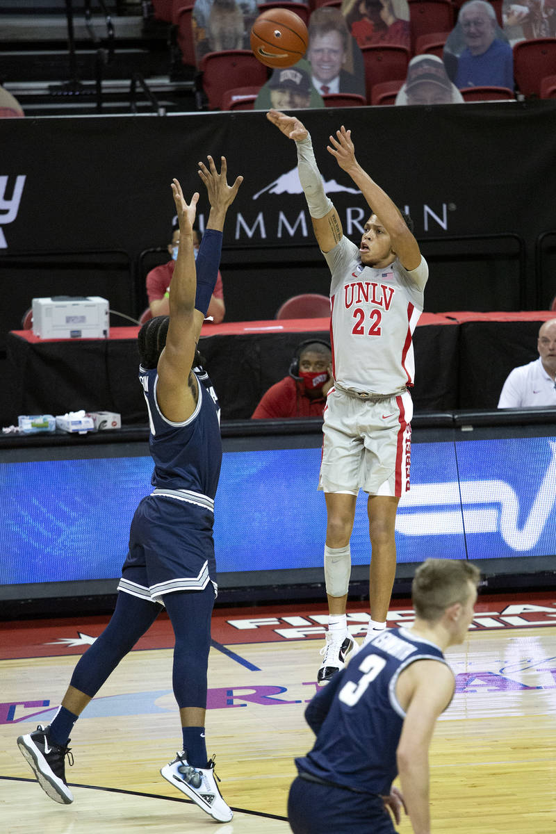 UNLV's guard Nicquel "Nick" Blake (22) attempts a point during the second half of a b ...