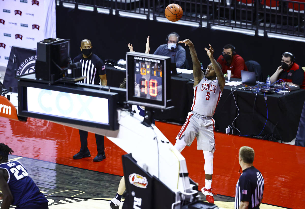 UNLV Rebels guard David Jenkins Jr. (5) shoots against the Utah State Aggies during the second ...