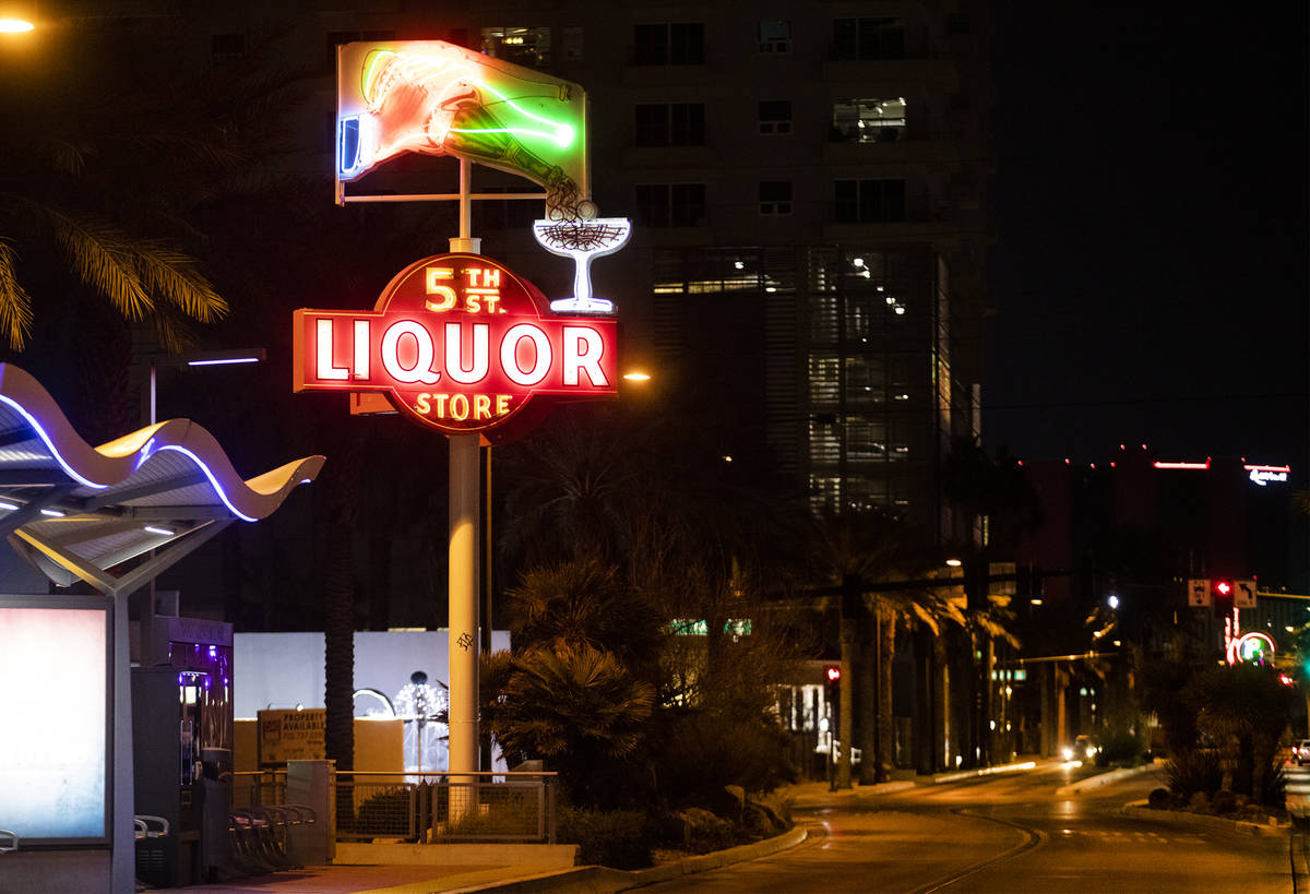 The restored neon sign for 5th Street Liquor Store on Casino Center in Downtown Las Vegas, Wedn ...