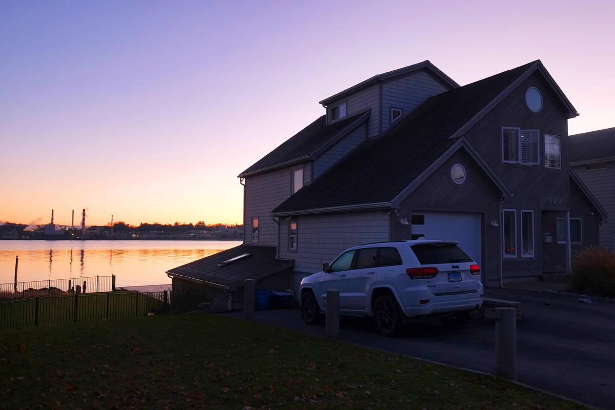 The early morning sun lights up the home at 500 Pequot Ave., along the Thames River, pictured o ...