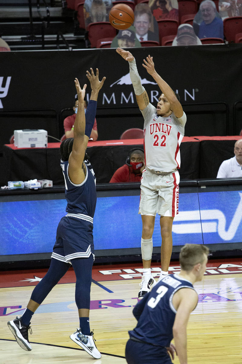 UNLV's guard Nicquel "Nick" Blake (22) attempts a point during the second half of a b ...