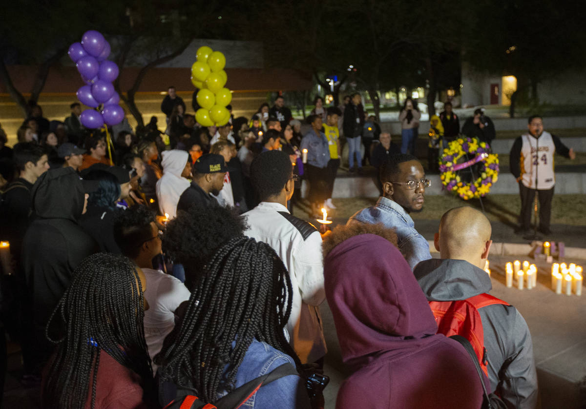 Attendees listen to stories about the impact Kobe Bryant had on his fans lives during a vigil f ...