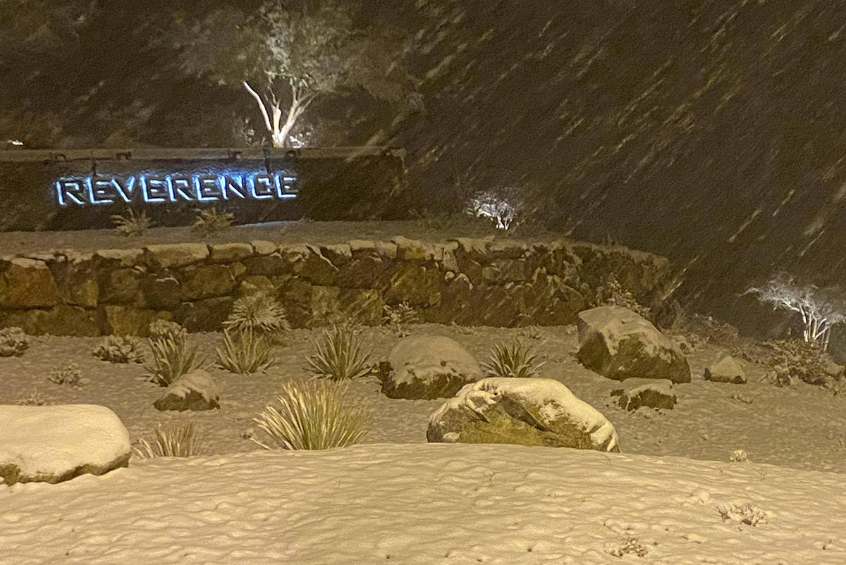 Snow covers portions of the entrance to Reverence subdivision at West Lake Mead at Clark County ...