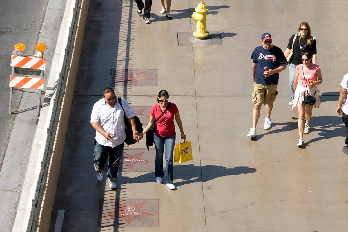 Pedestrians walk along the Las Vegas Walk of Stars in this file photo. (Las Vegas Review-Journal)