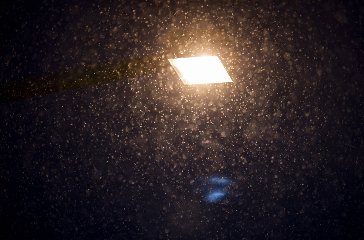 Snow flurries come down in Summerlin near Gardens Park on Tuesday, Jan. 26, 2021, in Las Vegas ...