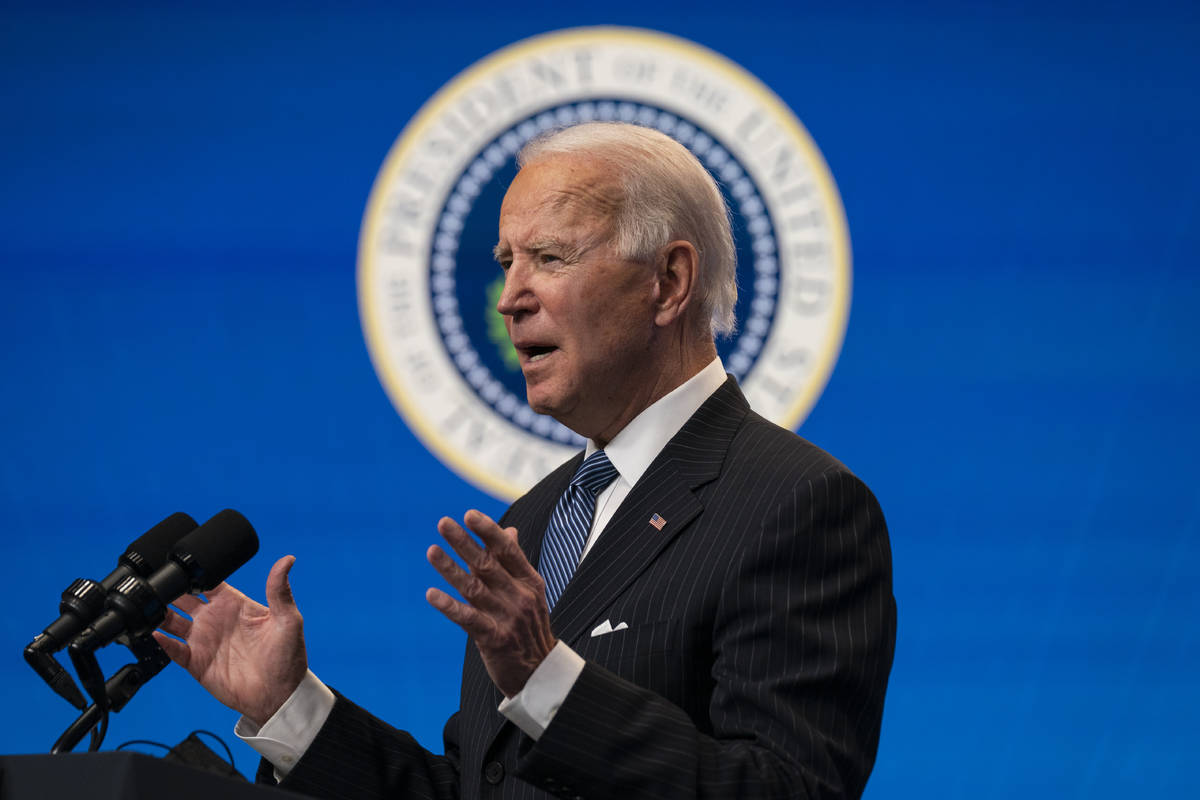 President Joe Biden answers questions from reporters in the South Court Auditorium on the White ...