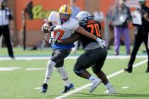 National Team defensive lineman Rashad Weaver of Pittsburgh (17) battles National Team offensiv ...