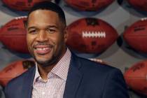 In this Thursday, Nov. 30, 2017 file photo, Former New York Giant Michael Strahan poses for a p ...