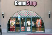 A GameStop storefront is shown before opening Thursday morning, Jan. 28, 2021, in Dallas. The ...