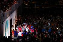 Kansas City Chiefs quarterback Patrick Mahomes (15) walks though the crowd during Opening Night ...