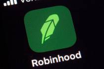 A Dec. 17, 2020, file photo shows the logo for the Robinhood app on a smartphone in New York. ...