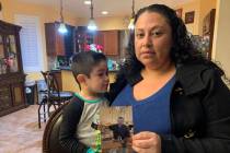 Nancy Espinoza, 37, sits with her 3-year-old son at their home in Corona, Calif., on Thursday, ...