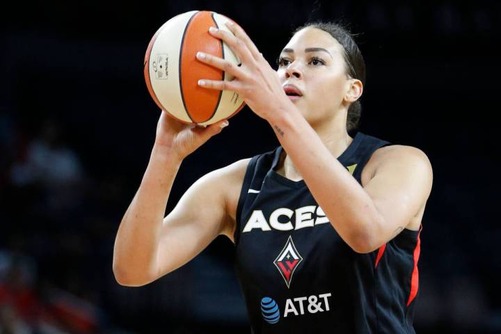 Las Vegas Aces' Liz Cambage (8) plays against the Washington Mystics during the first half of G ...