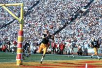 Green Bay Packers wide receiver Max McGee (85) gets set to catch the ball in the end zone for a ...