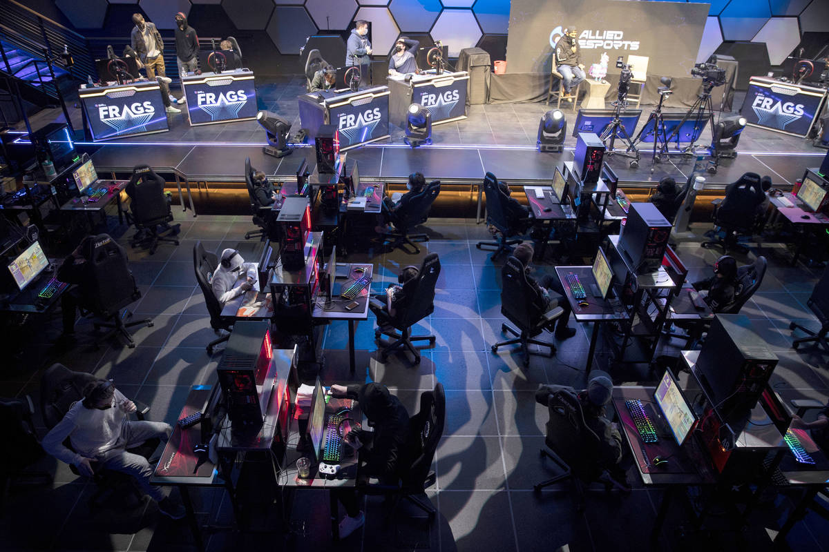 Players get ready for the Fortnite tournament "Friday Night Frags" at the HyperX Espo ...