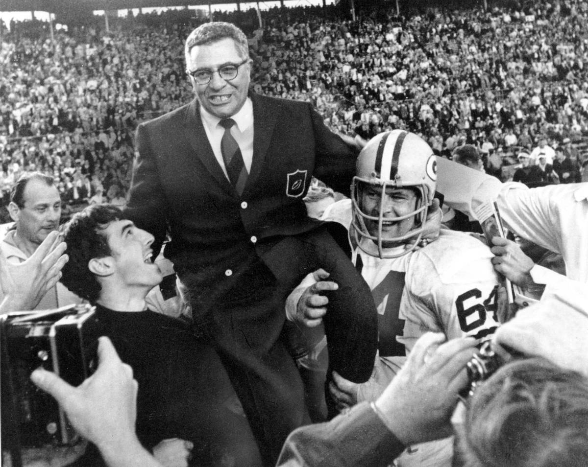 ** FILE ** Green Bay Packers coach Vince Lombardi is carried off the field after his team defe ...