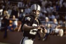 Wide receiver Fred Biletnikoff of the Oakland Raiders looks for a pass at the Oakland Coliseu ...
