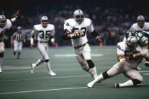 Oakland Raiders linebacker Rod Martin (53) intercepts a pass and runs upfield during Super Bowl ...