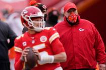 In this Sunday, Jan. 17, 2021 file photo, Kansas City Chiefs head coach Andy Reid, right, watch ...