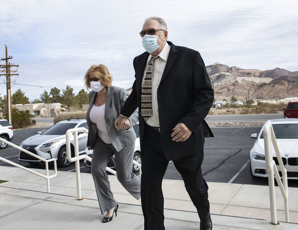 Patricia, left, and her husband Marcel Chappuis arrive at the Beatty Justice Court for their pl ...