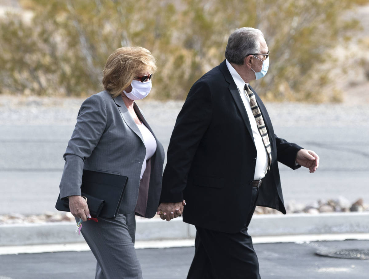 Patricia, left, and her husband Marcel Chappuis arrive at the Beatty Justice Court for their pl ...