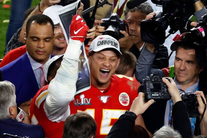 Kansas City Chiefs quarterback Patrick Mahomes (15) celebrates after defeating the San Francisc ...