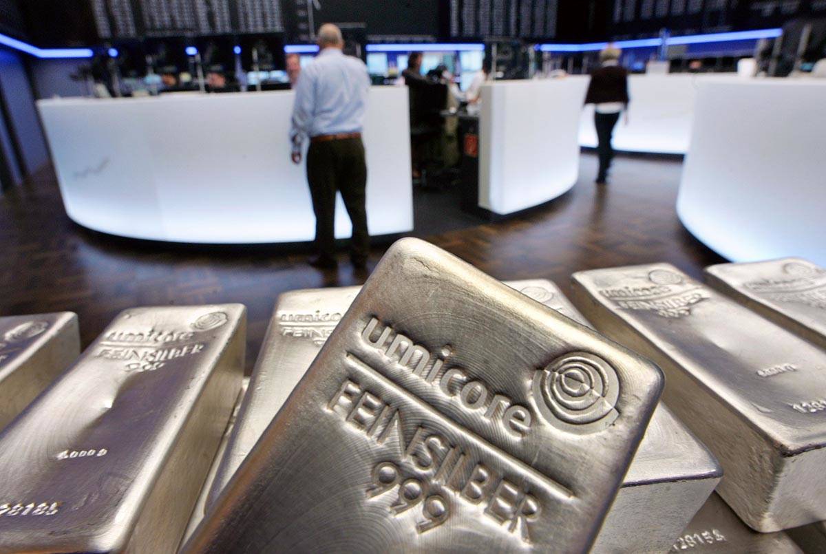 In a file photo dated Wednesday, May 9, 2007, Silver bullion, bars weighing five kilograms each ...