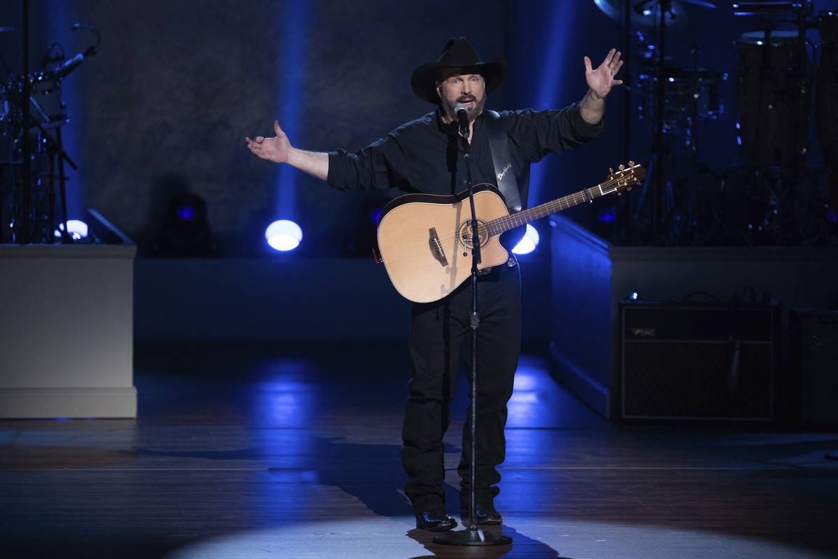 In this March 4, 2020, file photo, Garth Brooks performs on stage during the 2020 Gershwin Priz ...