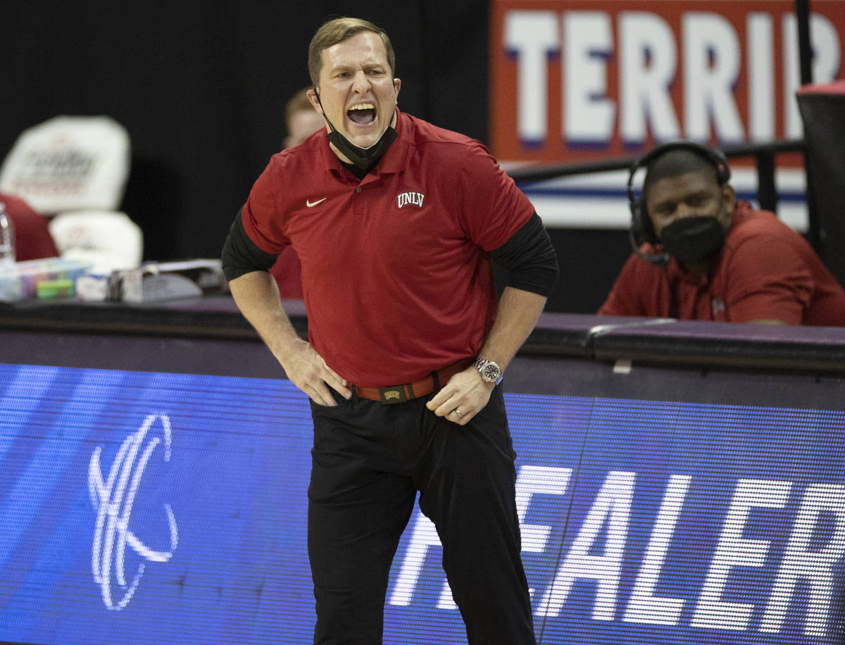 UNLV Rebels head coach T.J. Otzelberger calls an offensive play in the first quarter during an ...