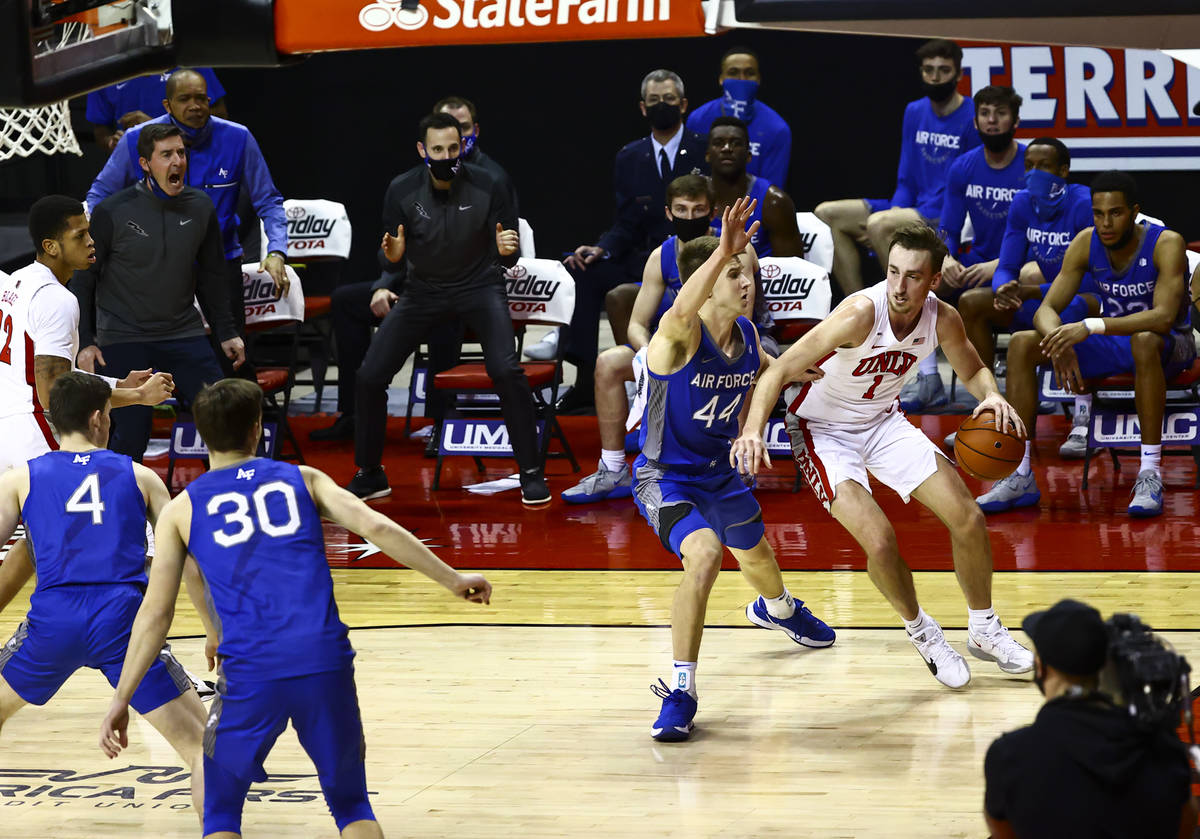 UNLV Rebels forward Moses Wood (1) drives to the basket against Air Force Falcons forward Keato ...