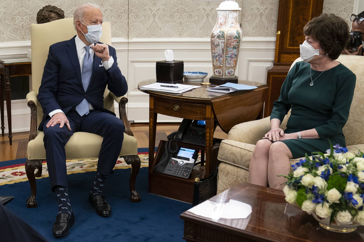 President Joe Biden meets with Sen. Susan Collins, R-Maine, to discuss a coronavirus relief pac ...