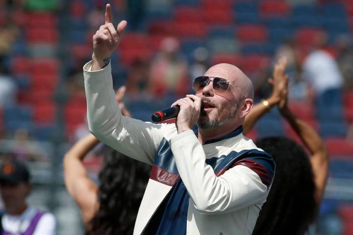 Pitbull performs prior to a NASCAR Cup Series auto race at Phoenix Raceway in Avondale Ariz., i ...