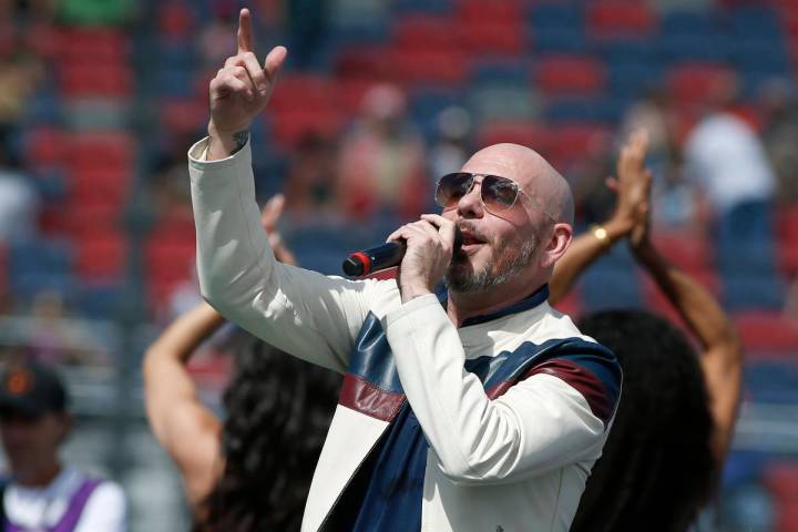 Pitbull performs prior to a NASCAR Cup Series auto race at Phoenix Raceway in Avondale Ariz., i ...