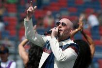 Pitbull performs prior to a NASCAR Cup Series auto race at Phoenix Raceway in Avondale Ariz., i ...