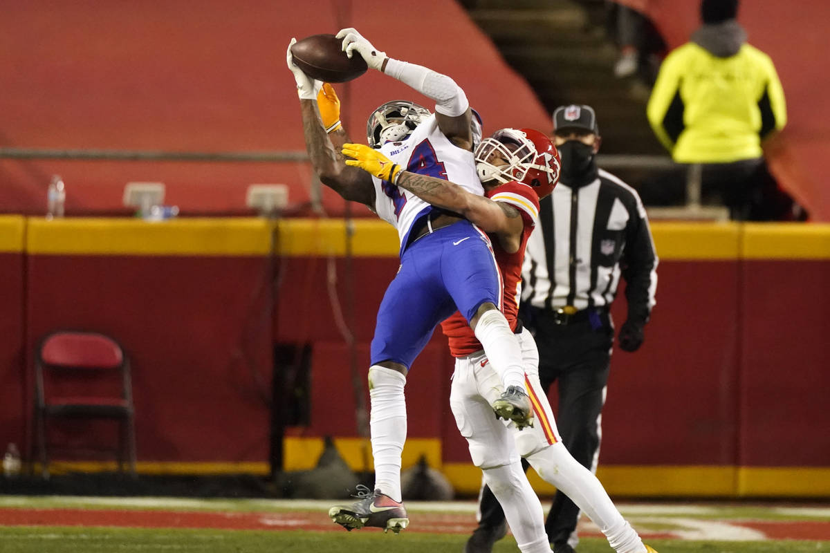 Buffalo Bills wide receiver Stefon Diggs is tackled by Kansas City Chiefs safety Tyrann Mathieu ...