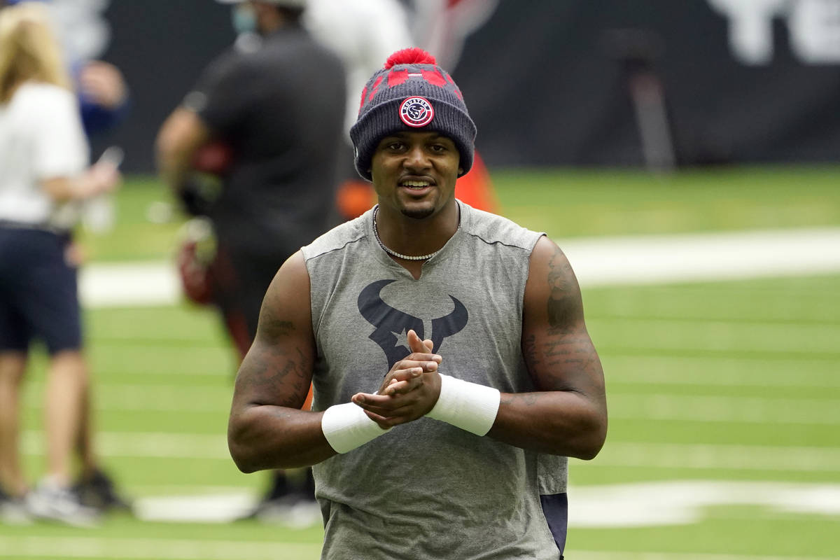 Houston Texans quarterback Deshaun Watson warms up before an NFL football game against the Cinc ...