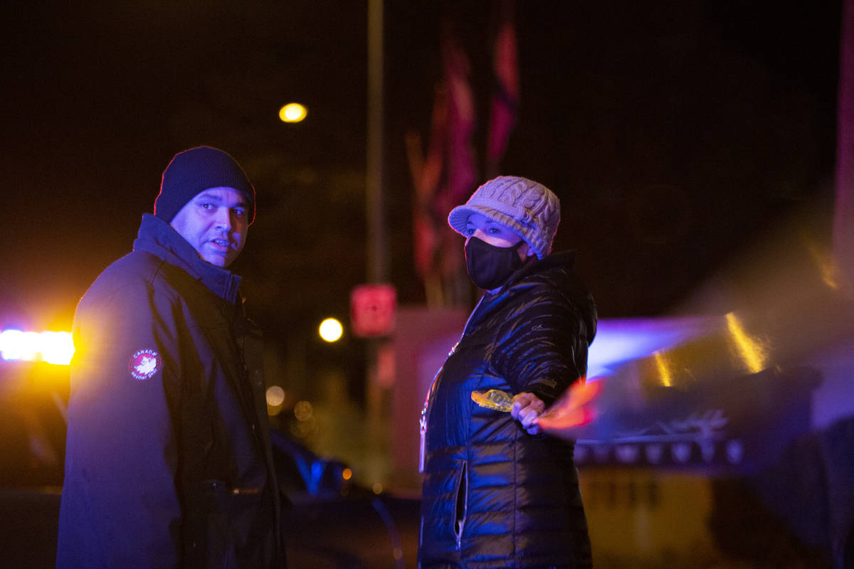 Homicide Lt. Ray Spencer arrives to the scene of a homicide near the intersection of Lake Mead ...