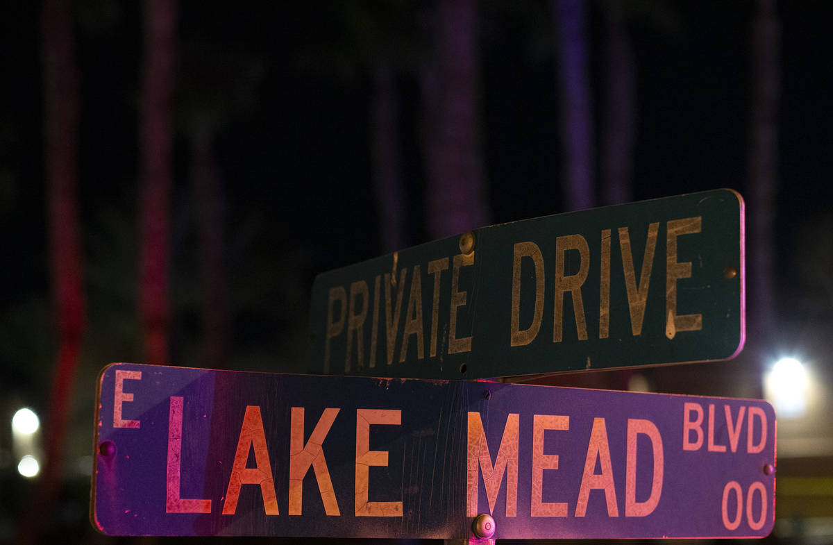 Metropolitan police investigate a homicide near the intersection of Lake Mead Boulevard and Los ...