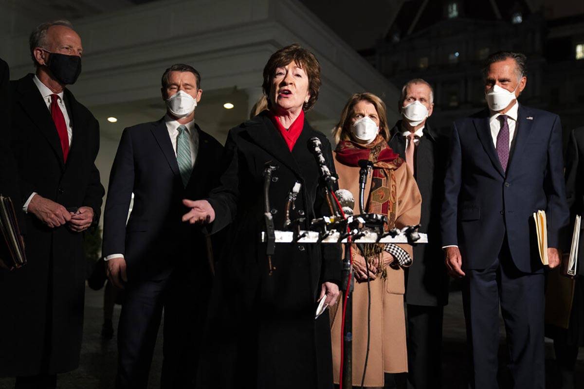 Sen. Susan Collins, R-Maine, speaks after meeting President Joe Biden and Vice President Kamala ...