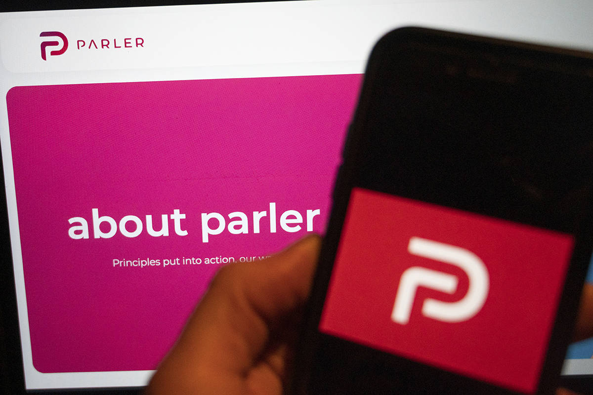 The logo of the social media platform Parler. (Christophe Gateau/dpa via AP)